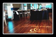 Tresca Monogram in front of Sweetheart Table